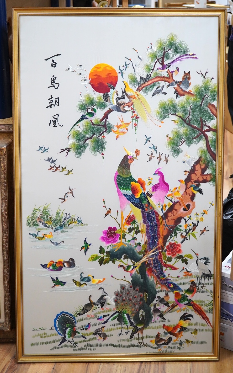 A modern Chinese embroidery on silk depicting birds of paradise, signed with character marks, 120 x 67cm. Condition - good